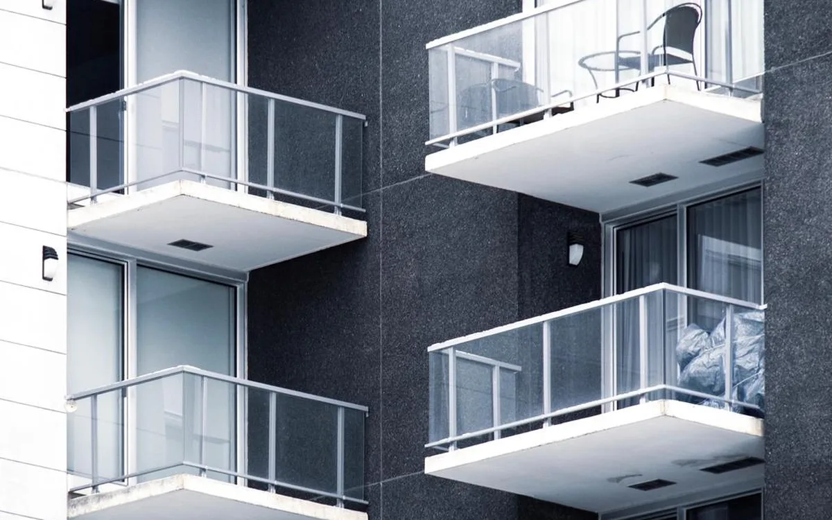 Modern residential balconies fitted with tempered glass railing panels